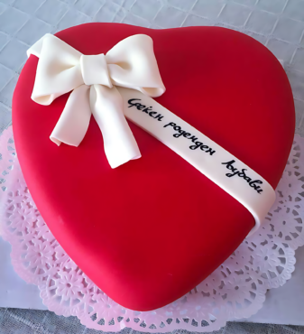 Heart-Shaped Red Cake with White Bow