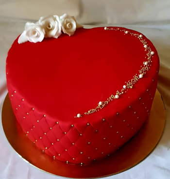Luxurious Red Heart Cake with Gold Accents