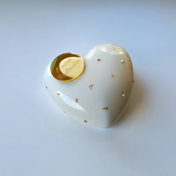 Elegant White Heart Cake with Gold Accents