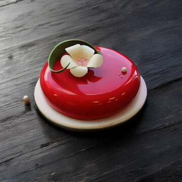 Red Mirror Glaze Cake with Floral Accent