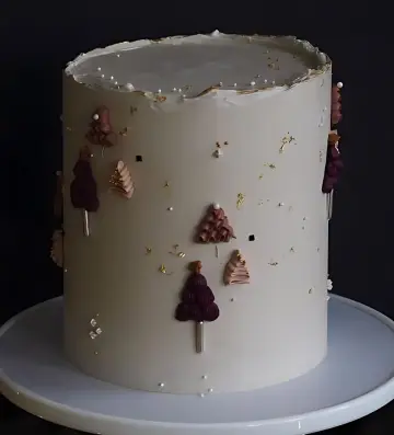 Winter-Themed Buttercream Cake with Festive Tree Accents